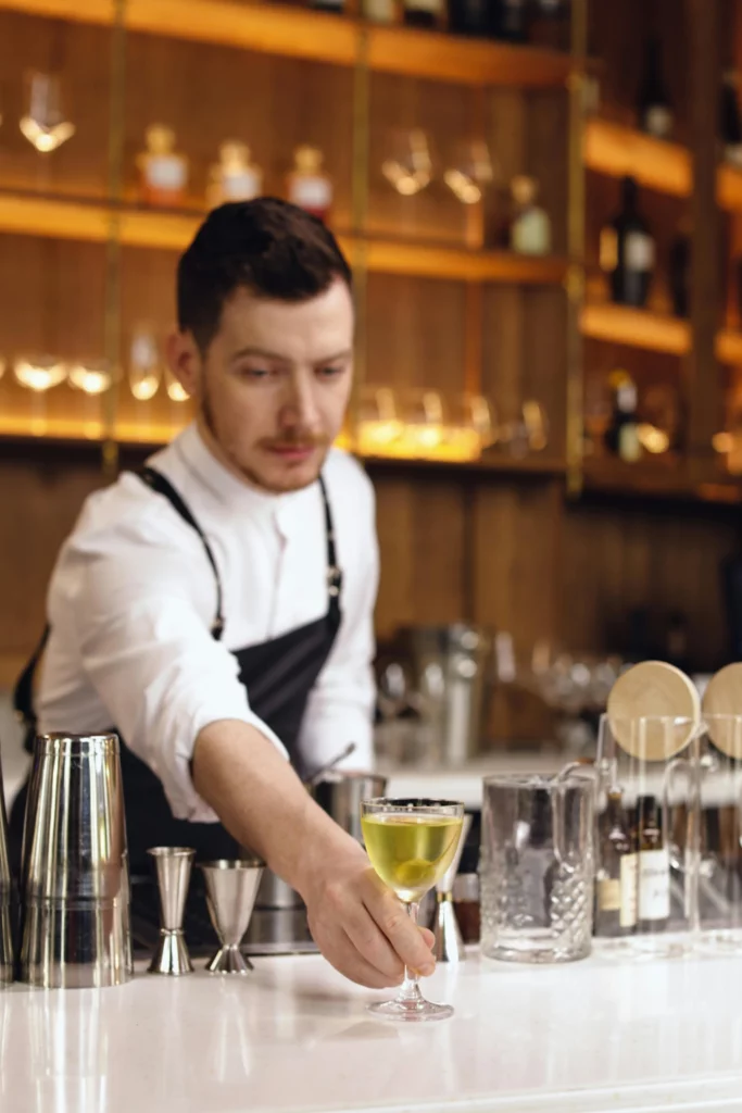 Bartender serving cocktails